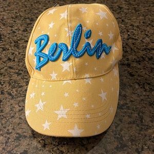 A Yellow and Blue German Berlin hat with White Stars, adjustable. NWT